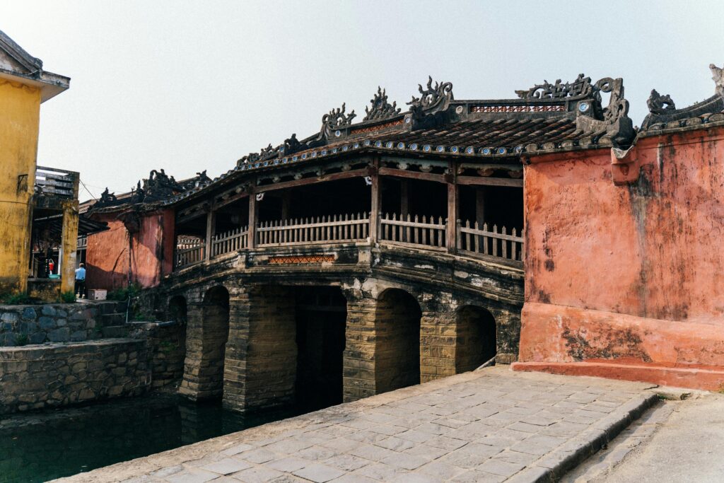 Historic Japanese Covered Bridge in Hoi An displaying traditional Asian architecture.